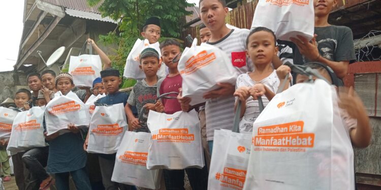 Rumah Zakat Sulsel Ceriakan Wajah Yatim dan Dhuafa di Parang Tambung